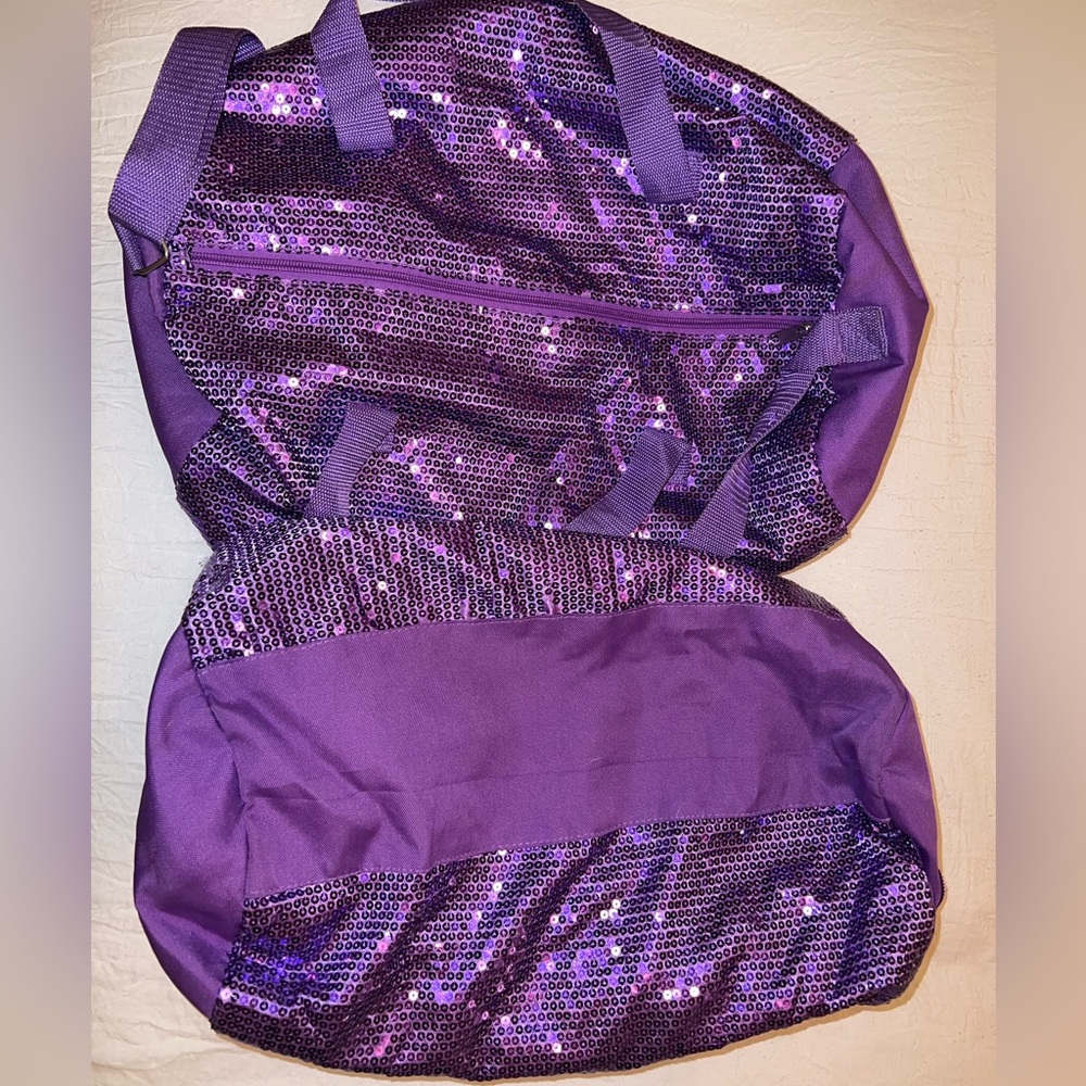 Purple sparkly duffel bag